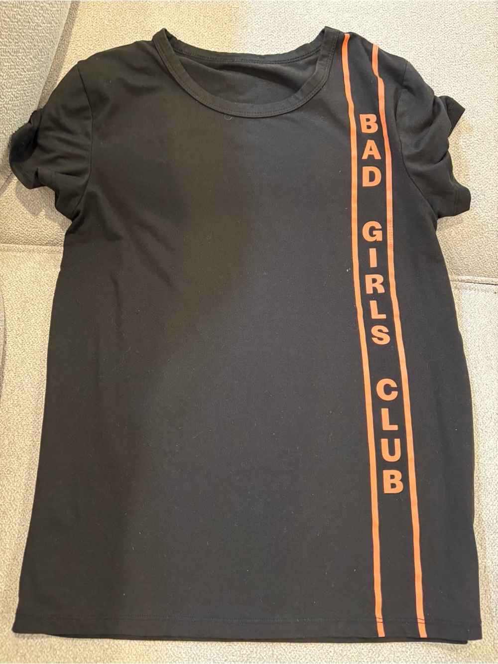 Women’s Black Tee with Orange 'Bad Girls Club' Stripe